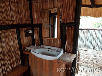 Rustic bathroom washbasin inside the four-sleeper Thalu Bush Camp